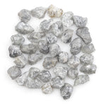light grey raw diamond with a natural rough texture for engagement jewelry designs