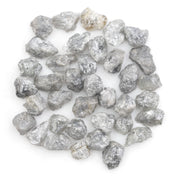 light grey raw diamond with a natural rough texture for engagement jewelry designs