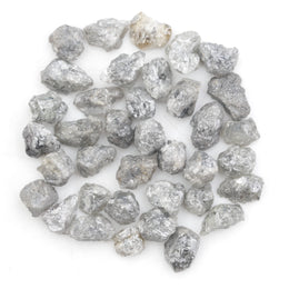 light grey raw diamond with a natural rough texture for engagement jewelry designs
