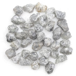 light grey raw diamond with a natural rough texture for engagement jewelry designs