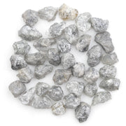 light grey raw diamond with a natural rough texture for engagement jewelry designs