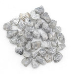 light grey raw diamond with a natural rough texture for engagement jewelry designs