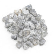 light grey raw diamond with a natural rough texture for engagement jewelry designs
