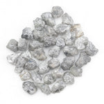 light grey raw diamond with a natural rough texture for engagement jewelry designs