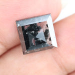 Square-cut black lab-grown diamond with polished facets, ideal for ethical jewelry, engagement rings, and custom luxury designs