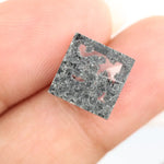 Square-cut black lab-grown diamond with polished facets, ideal for ethical jewelry, engagement rings, and custom luxury designs
