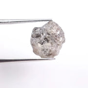 raw diamond light test, price of rough diamond per carat, quartz rock how to identify a raw diamond, natural princess cut diamond ring, black faceted diamond