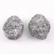Matching rough gray diamonds with natural uncut crystal texture
