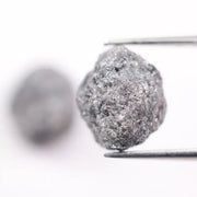 Matching rough gray diamonds with natural uncut crystal texture