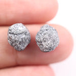 Matching rough gray diamonds with natural uncut crystal texture