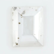 Emerald cut lab grown diamond loose stone with high clarity and subtle natural inclusions, transparent and ethically created for engagement ring or fine jewelry use