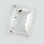 Emerald cut lab grown diamond loose stone with high clarity and subtle natural inclusions, transparent and ethically created for engagement ring or fine jewelry use