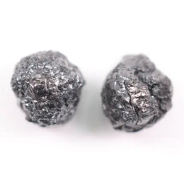 Matching pair of raw gray diamonds is especially rare, making them ideal for custom jewelry designs.