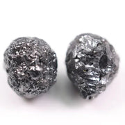 Matching pair of raw gray diamonds is especially rare, making them ideal for custom jewelry designs.