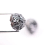 Matching pair of raw gray diamonds is especially rare, making them ideal for custom jewelry designs.