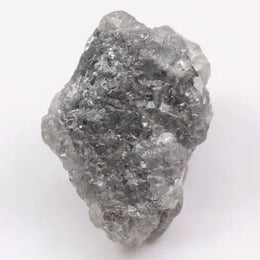 Gray diamond solitaire ring on a white gold band, highlighting its unique, sophisticated look.