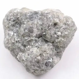 A close-up view of a grey diamond showcasing its unique salt-and-pepper appearance with visible mineral inclusions.