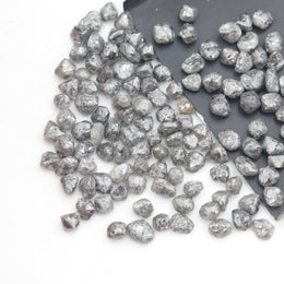 unique grey raw diamond with an irregular uncut rough profile for jewelry projects
