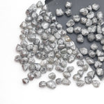 unique grey raw diamond with an irregular uncut rough profile for jewelry projects