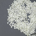 white natural rough crystal stone displayed as a loose uncut raw piece