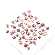 Rare natural fancy red and brown rose cut diamond mixed shapes earth mined loose diamond for custom jewelry, artisan rings, and unique engagement ring designs.