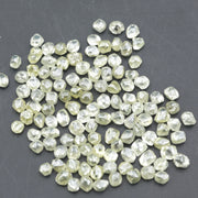 natural light yellow rough stone crystal shown as a loose uncut raw piece