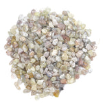 mixed color natural rough diamond chips displayed as loose uncut raw pieces