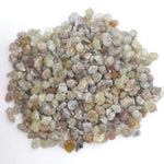 mixed color natural rough diamond chips displayed as loose uncut raw pieces