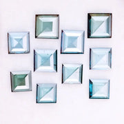 Square step cut blue lab grown diamonds in fancy light teal color, calibrated loose stones for custom fine jewelry design