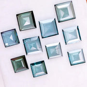 Square step cut blue lab grown diamonds in fancy light teal color, calibrated loose stones for custom fine jewelry design