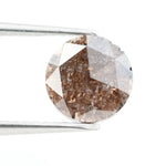 Close-up of a premium round cut brown lab-grown diamond with sparkling facets, showcasing eco-friendly, conflict-free quality and unique natural-like inclusions.
