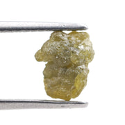 1.18 carat yellow raw diamond with a natural unpolished surface for a custom gold ring setting
