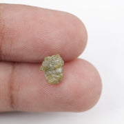 1.18 carat yellow raw diamond with a natural unpolished surface for a custom gold ring setting