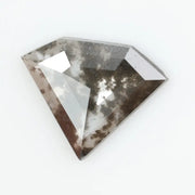 Beautiful lab-grown diamond with intricate natural inclusions, showcasing brilliant clarity and unique cut, ethically sourced for a sustainable future.