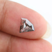 Beautiful lab-grown diamond with intricate natural inclusions, showcasing brilliant clarity and unique cut, ethically sourced for a sustainable future.