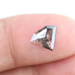 Beautiful lab-grown diamond with intricate natural inclusions, showcasing brilliant clarity and unique cut, ethically sourced for a sustainable future.