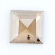 Square princess-cut lab-grown diamond with flawless clarity and subtle champagne hue, perfect for engagement rings and custom fine jewelry, ethically created with sustainable practices