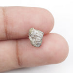 1.56 carat yellow diamond in uncut natural form, ideal for crafting a distinctive cocktail ring.