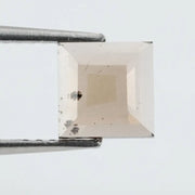 Square princess-cut lab-grown diamond with flawless clarity and subtle champagne hue, perfect for engagement rings and custom fine jewelry, ethically created with sustainable practices