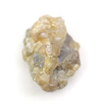 1.52 carat yellow natural diamond in its unpolished form for creating leaf-style jewelry designs.