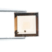 Square princess-cut lab-grown diamond with flawless clarity and subtle champagne hue, perfect for engagement rings and custom fine jewelry, ethically created with sustainable practices