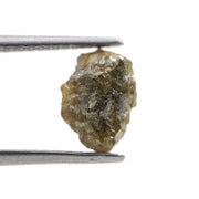 1.52 carat yellow natural diamond in its unpolished form for creating leaf-style jewelry designs.