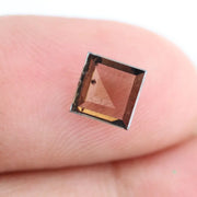 Square princess-cut lab-grown diamond with flawless clarity and subtle champagne hue, perfect for engagement rings and custom fine jewelry, ethically created with sustainable practices