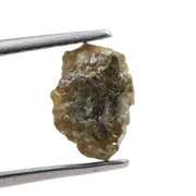 1.52 carat yellow natural diamond in its unpolished form for creating leaf-style jewelry designs.