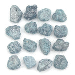 natural blue color rough diamond pieces arranged in an uncut loose diamond lot