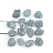 natural blue color rough diamond pieces arranged in an uncut loose diamond lot