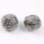 Conflict-free rough gray diamonds in organic matching pair for minimalist ring design