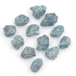 natural blue rough diamond pieces in a loose uncut raw diamond collection
