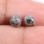 Conflict-free rough gray diamonds in organic matching pair for minimalist ring design