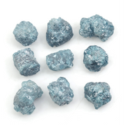 blue natural rough diamond pieces displayed for engagement ring and jewelry projects
